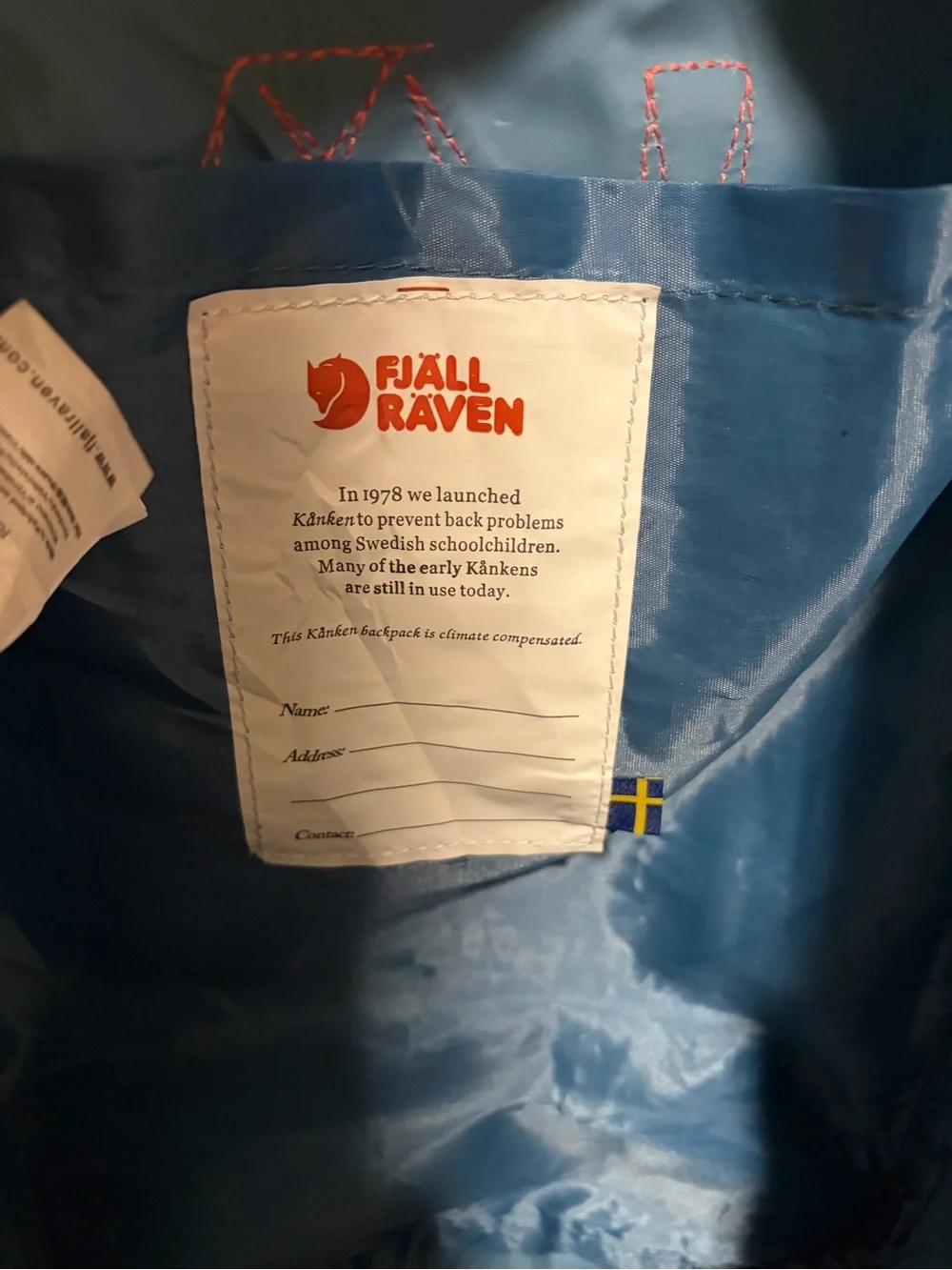 Fjallraven Kånken Blue Backpack with Coral Handles
